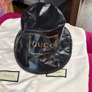 Gucci Shiny Black Hat with Gold Logo